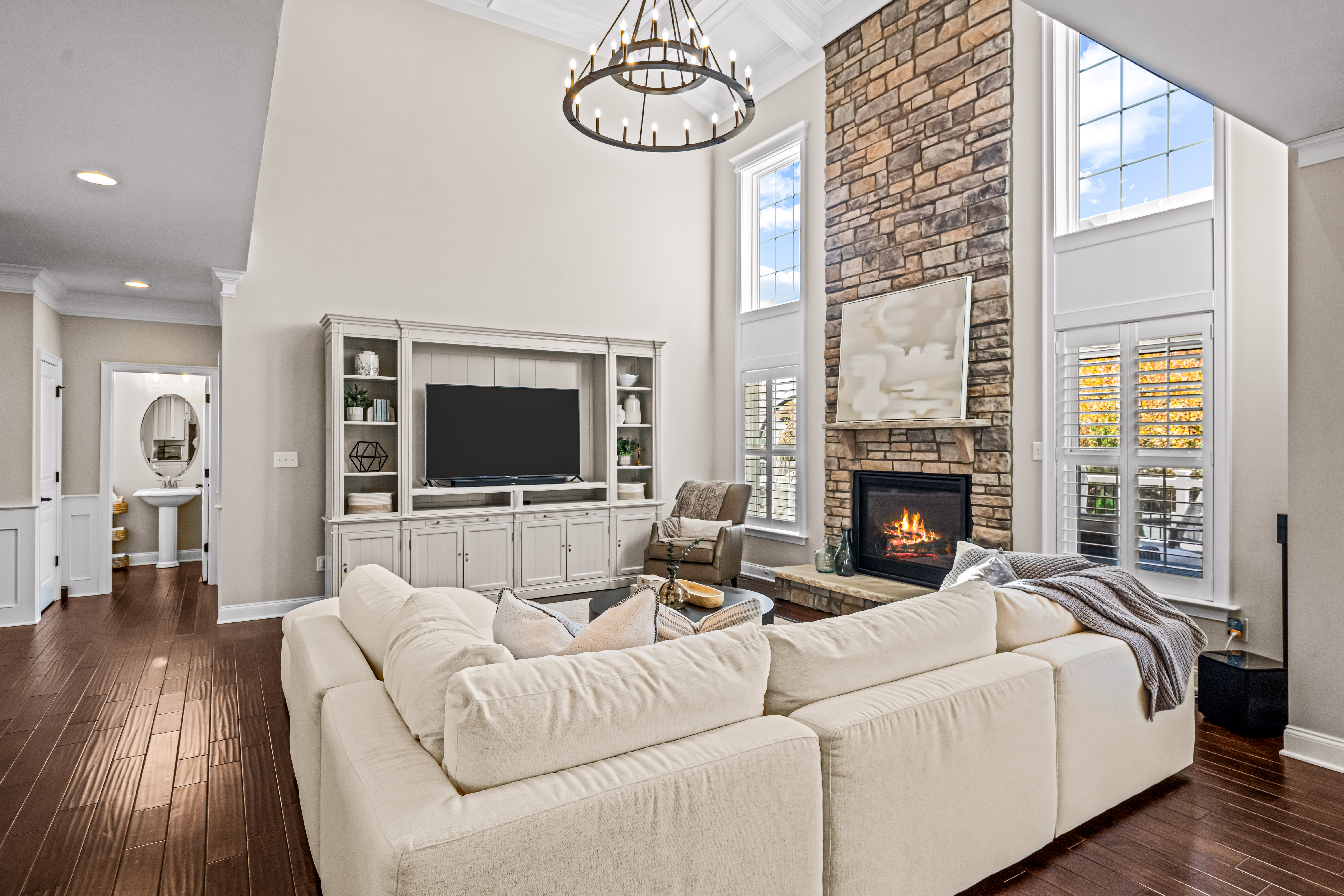 52 Wellesley Way Marlton, NJ 08053 - Photo 33 of 98 a living room with furniture a flat screen tv and a fireplace