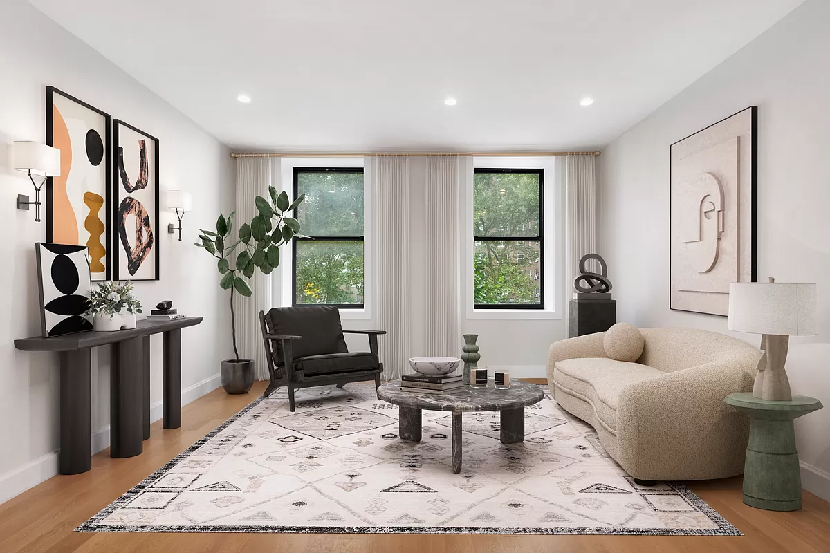 265 West 131st Street, Unit 6 Manhattan, NY 10027 - Photo 3 of 8 a living room with furniture and a large window