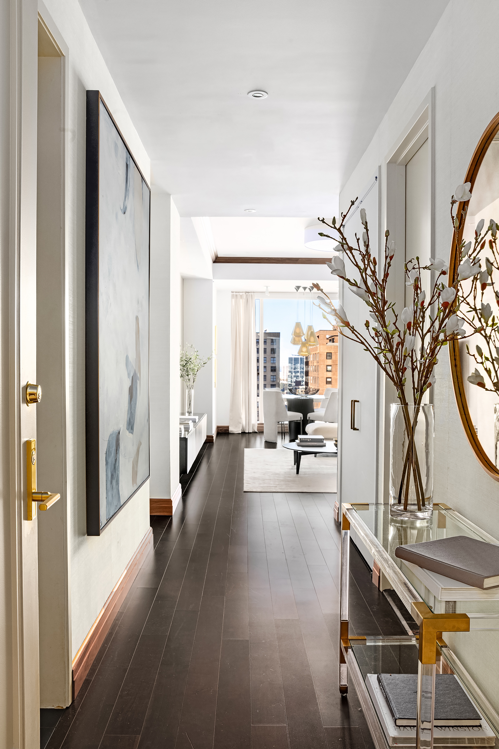 1 Central Park West, Unit 30E Manhattan, NY 10023 - Photo 3 of 12 a view of a livingroom with furniture and hardwood floor