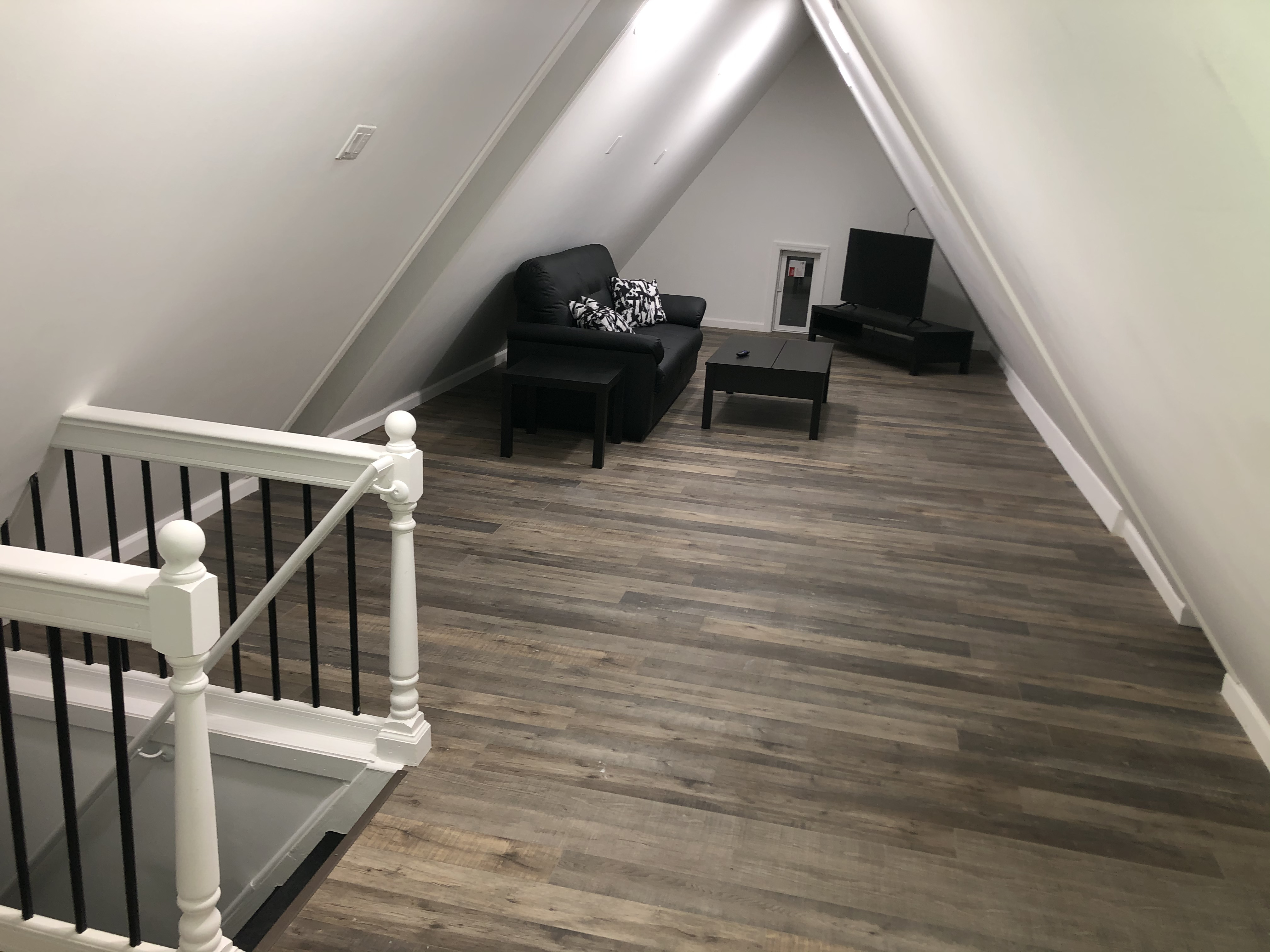 1112 Beverley Road Brooklyn, NY 11218 - Photo 4 of 53 a living room with furniture and a wooden floor