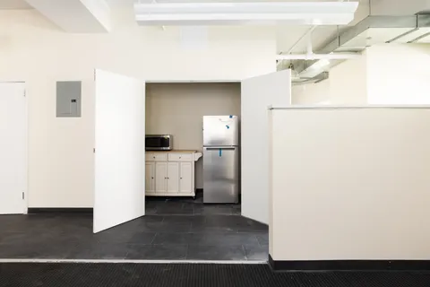 a view of a utility room with washer and dryer