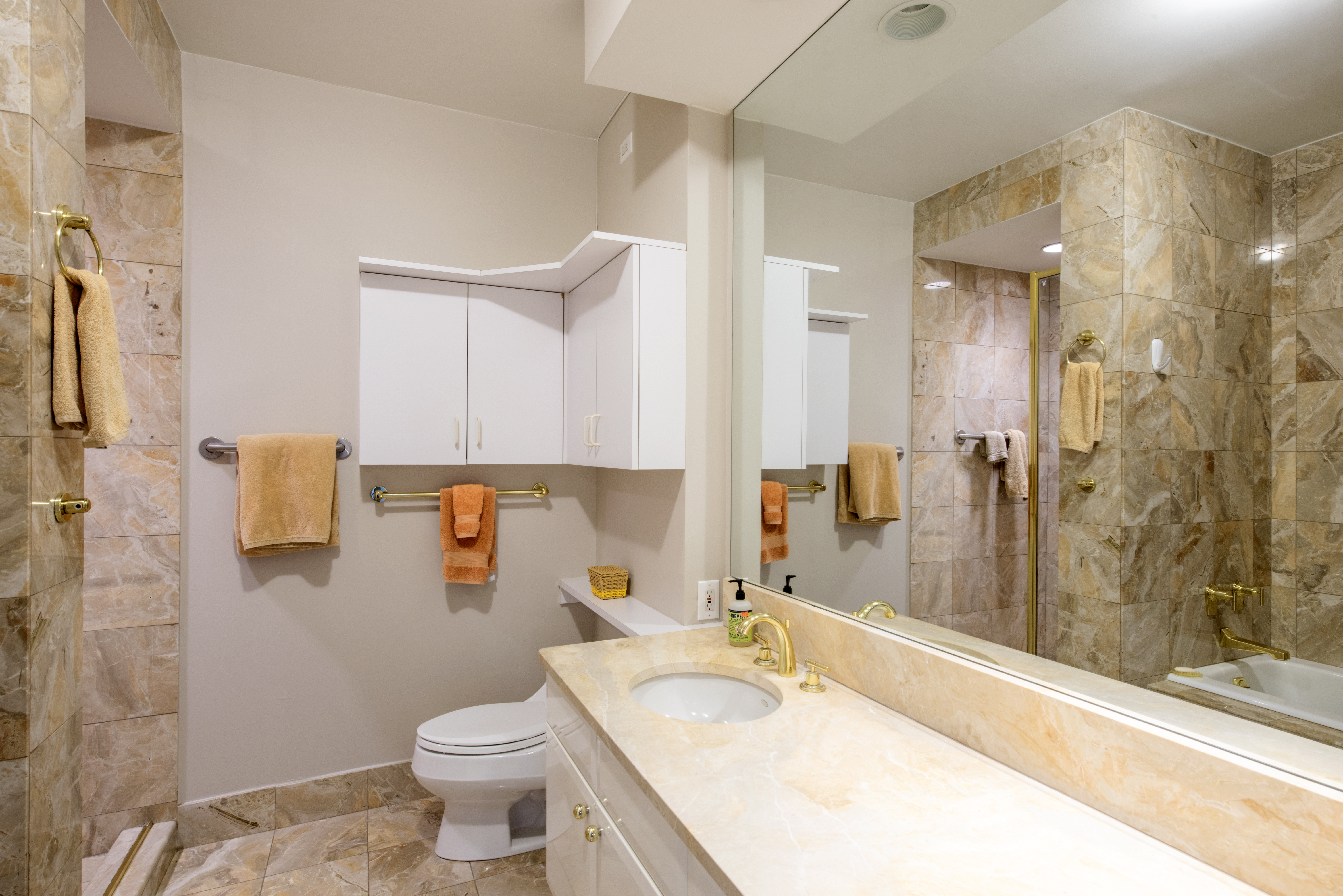 200 Riverside Boulevard, Unit PH1B Manhattan, NY 10069 - Photo 10 of 18 a bathroom with a sink toilet and shower