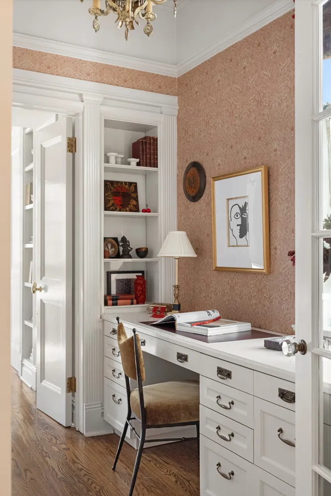 a workspace with furniture and lamp