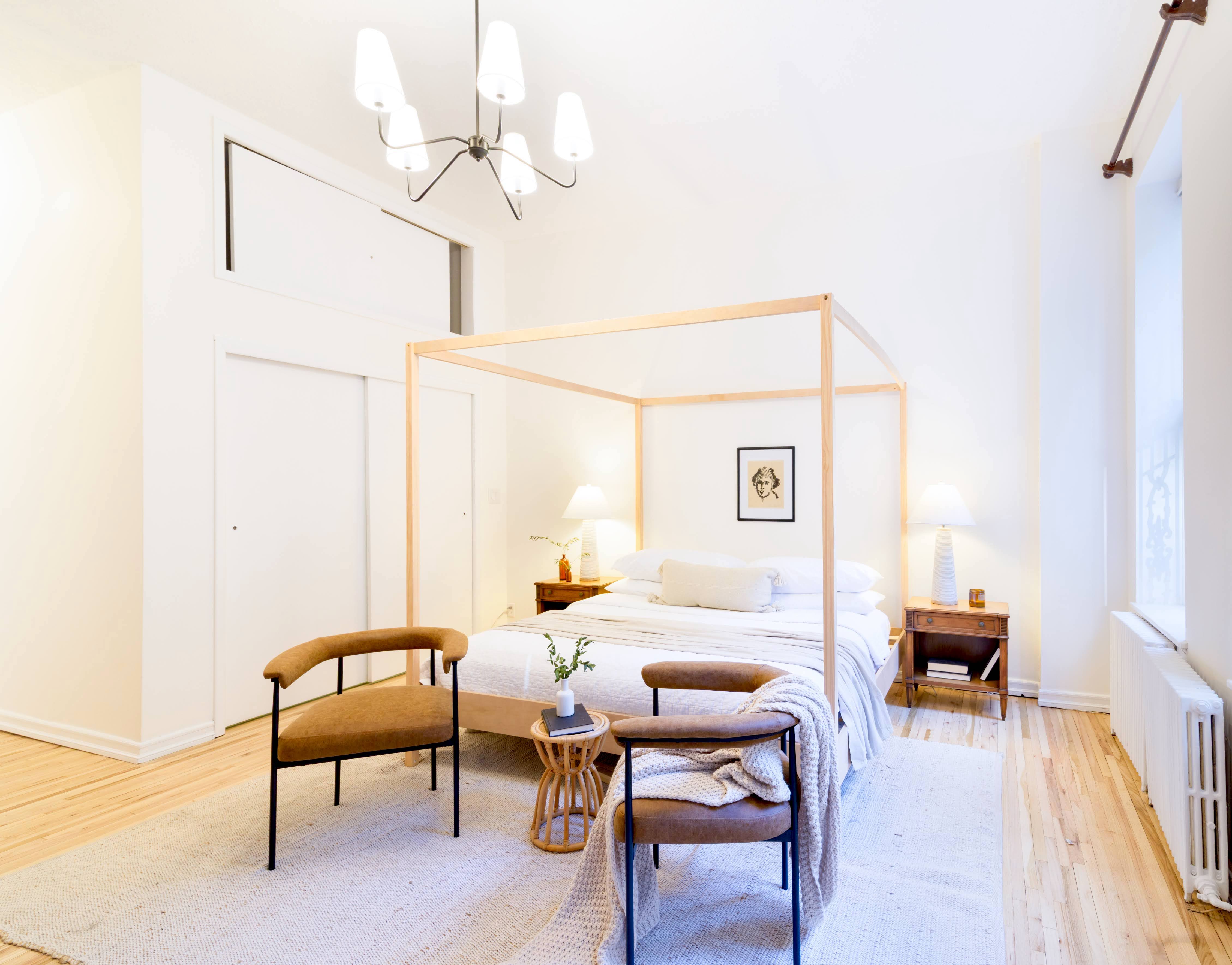 349 West 71st Street, Unit 1 Manhattan, NY 10023 - Photo 4 of 21 a bedroom with furniture and a wooden floor