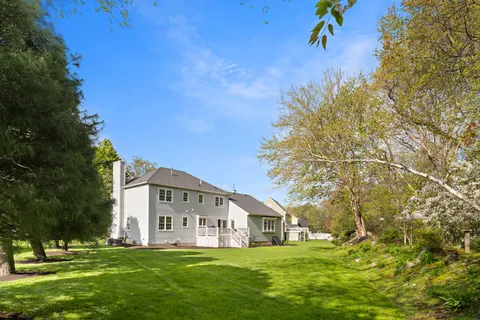 a view of a house with a big yard