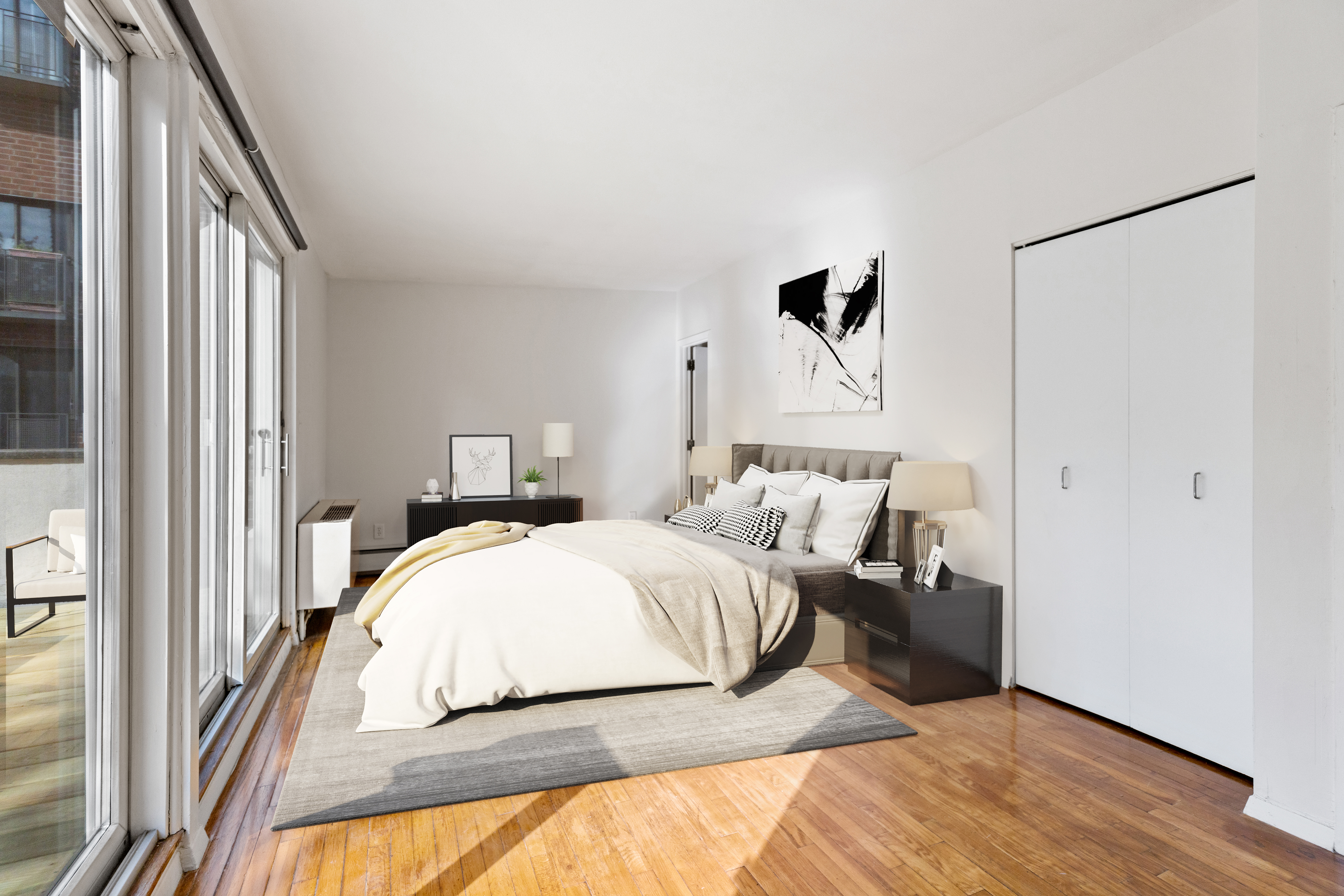 136 East 30th Street, Unit 3R Manhattan, NY 10016 - Photo 3 of 23 a bedroom with a bed and a window