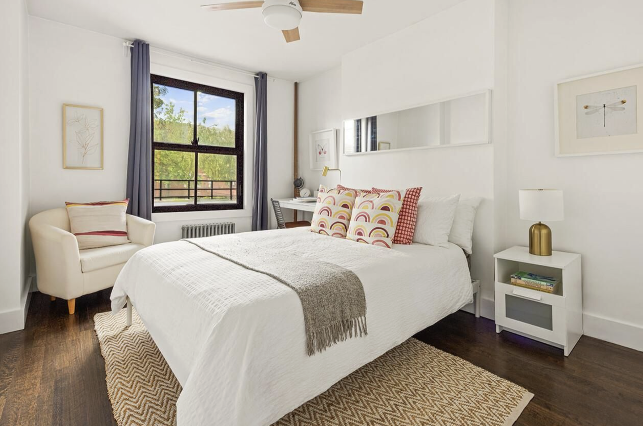 443 Hicks Street, Unit 2E Brooklyn, NY 11201 - Photo 6 of 12 a bedroom with a bed and a couch