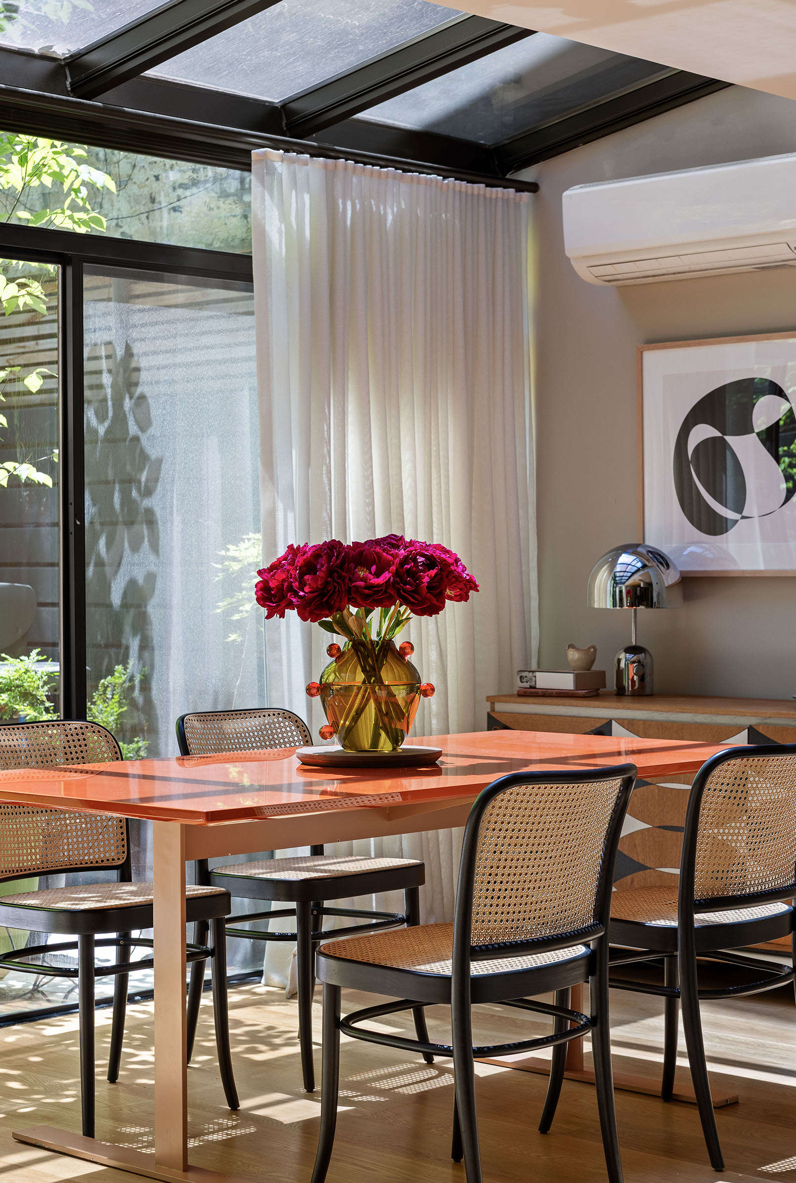 54 MacDougal Street, Unit 1 Manhattan, NY 10012 - Photo 7 of 23 a outdoor dining space with furniture and umbrella