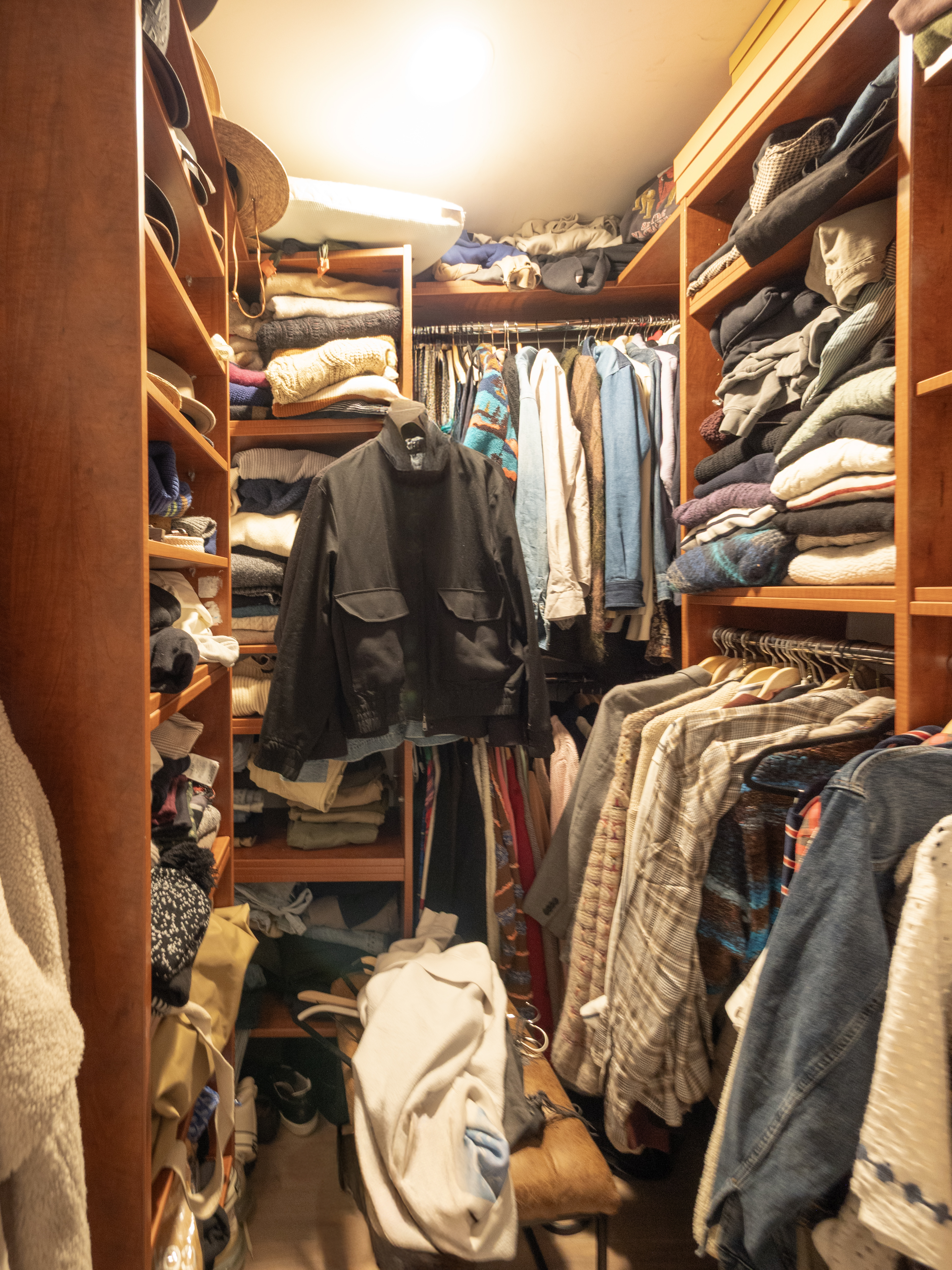 84 Front Street, Unit 5E Brooklyn, NY 11201 - Photo 6 of 11 a view of walk in closet with clothes and shoes