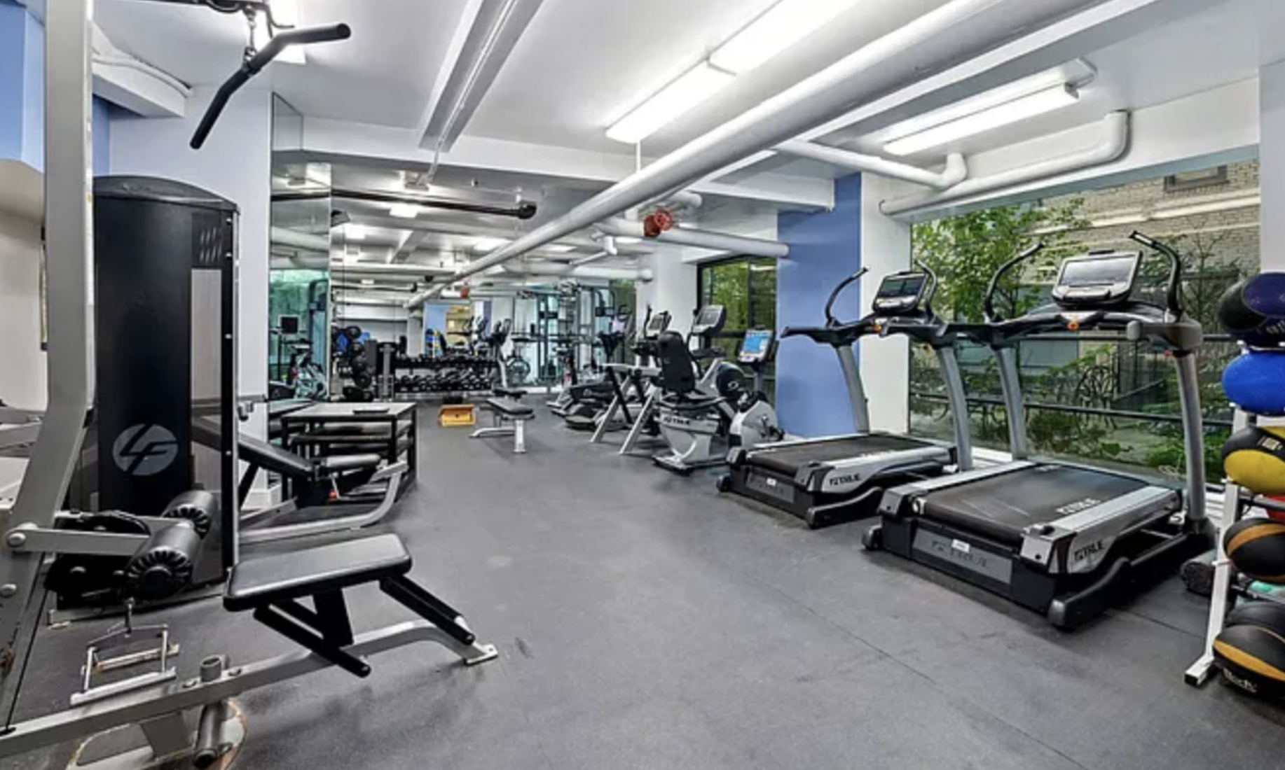230 Riverside Drive, Unit 8D Manhattan, NY 10025 - Photo 15 of 19 a view of a room with gym equipment