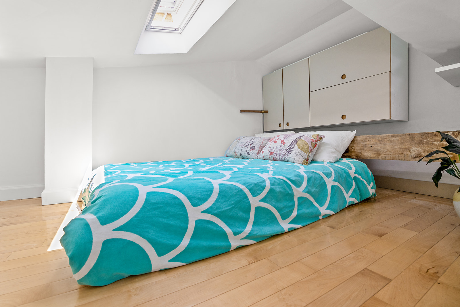 57 3rd Street, Unit 7 Brooklyn, NY 11231 - Photo 9 of 13 a bedroom with a bed and a painting on the wall