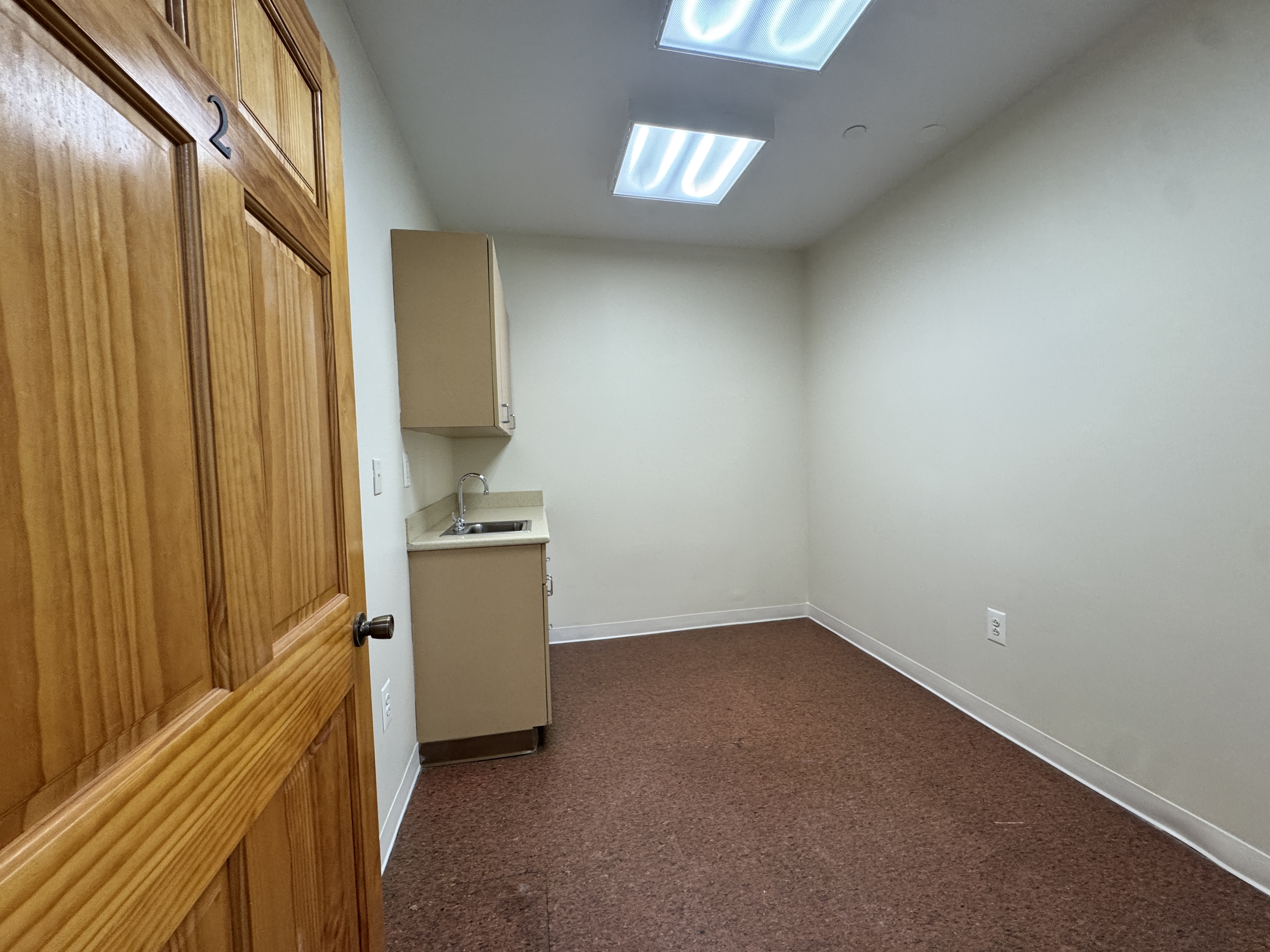 406 15th Street, Unit M1 Brooklyn, NY 11215 - Photo 4 of 19 a room with a sink and a mirror