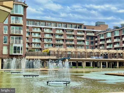 a view of swimming pool from a balcony