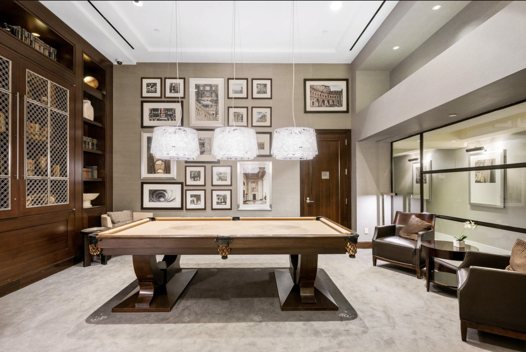 80 Riverside Boulevard, Unit 23C Manhattan, NY 10069 - Photo 17 of 19 a room with furniture pool table and windows