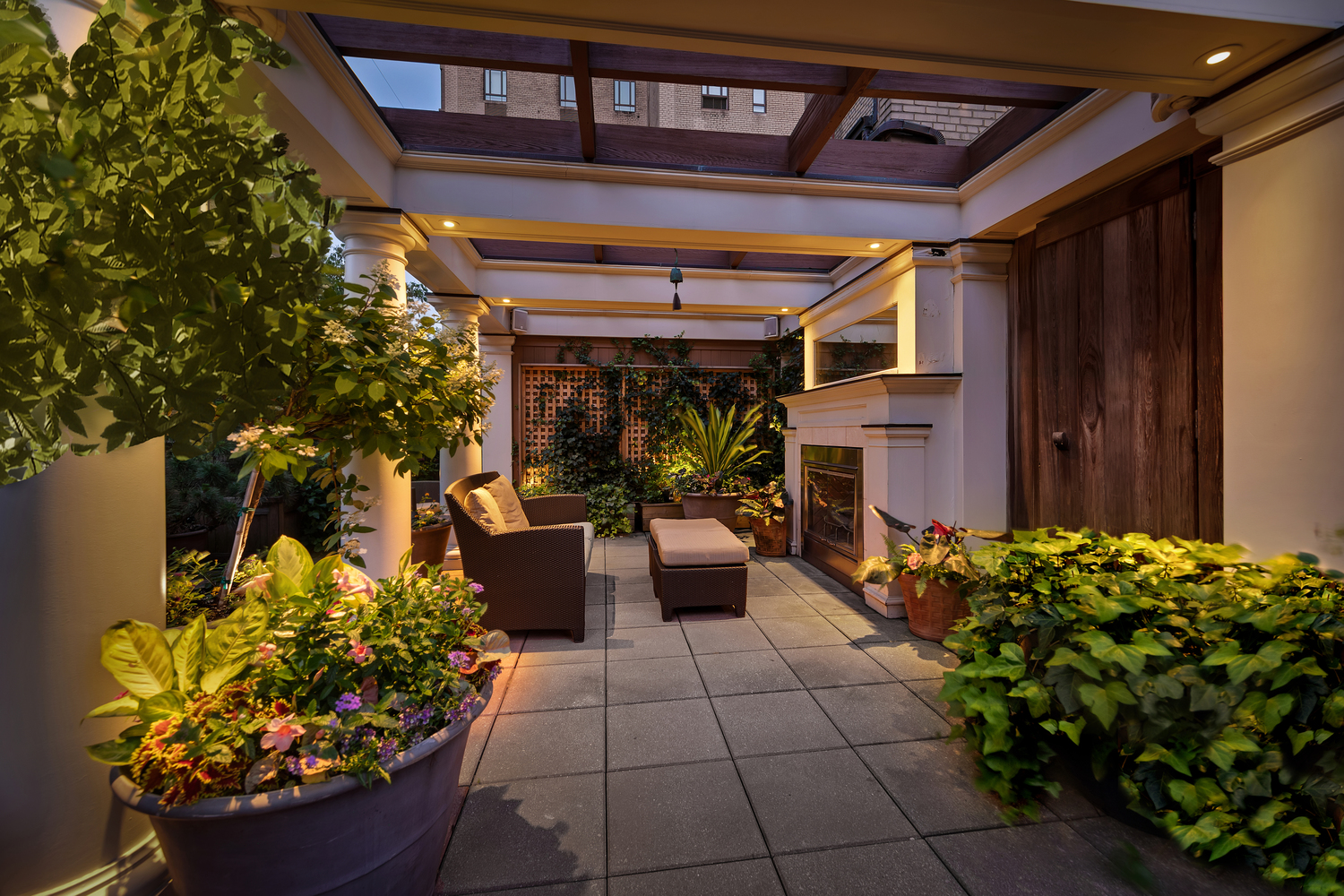 25 Central Park West, Unit 21J Manhattan, NY 10023 - Photo 32 of 37 a view of a porch with dining table and chairs