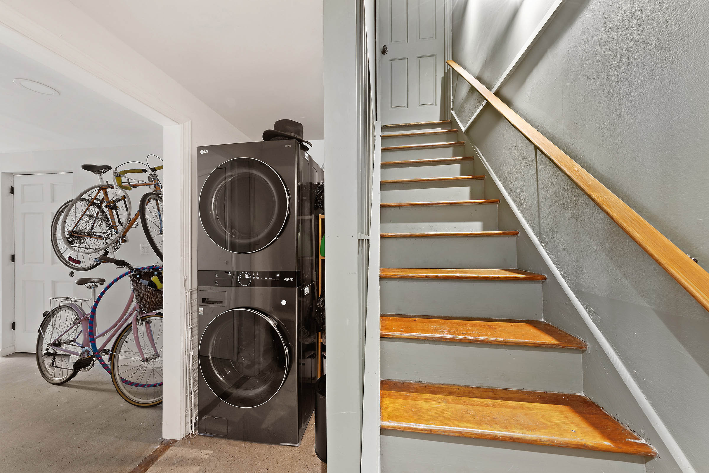209 Onderdonk Avenue Queens, NY 11385 - Photo 9 of 16 a view of a livingroom with washer and dryer