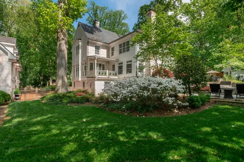 a house view with a sitting space and garden view