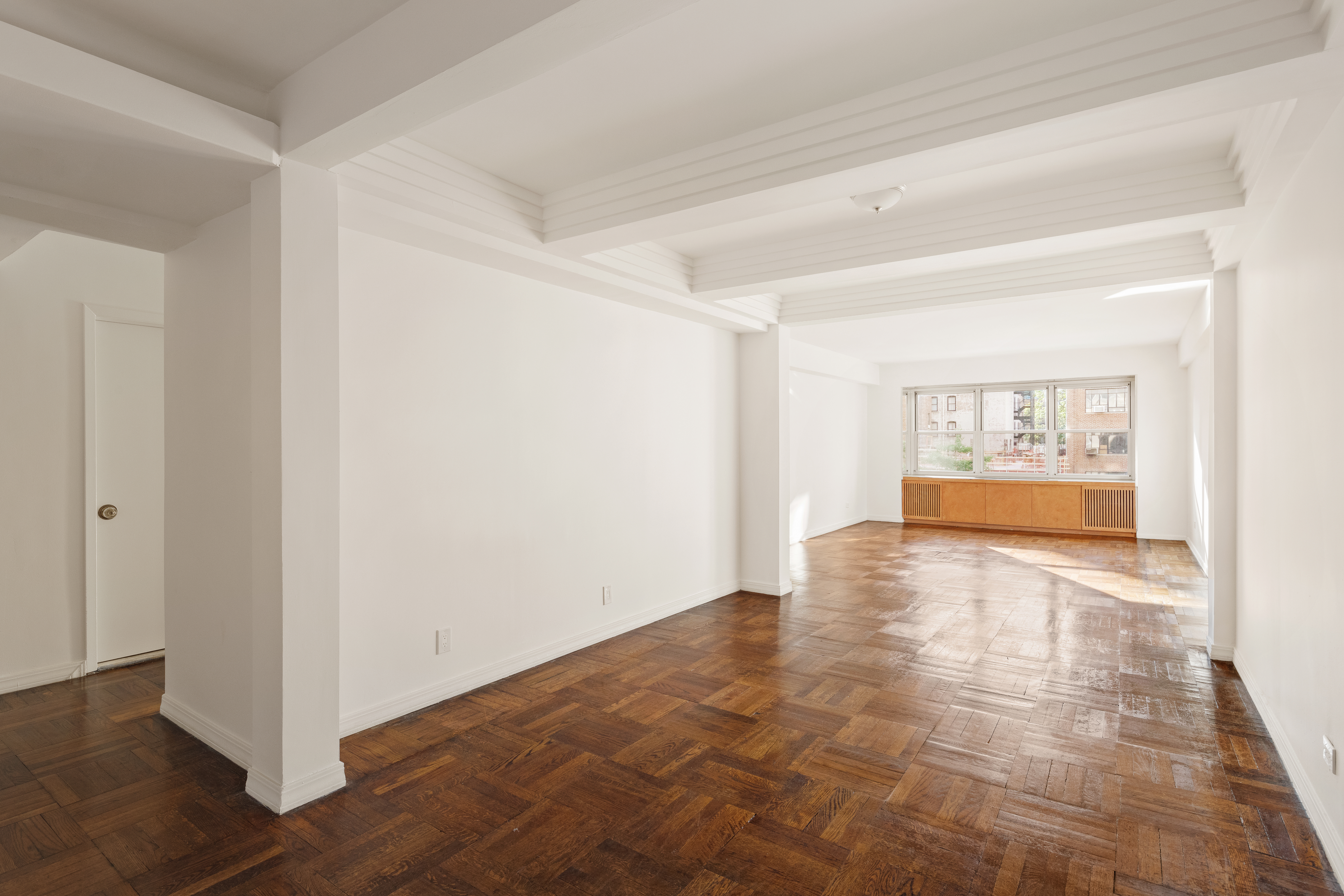 11 5th Avenue, Unit 5LW Manhattan, NY 10003 - Photo 4 of 19 a view of an empty room with a window