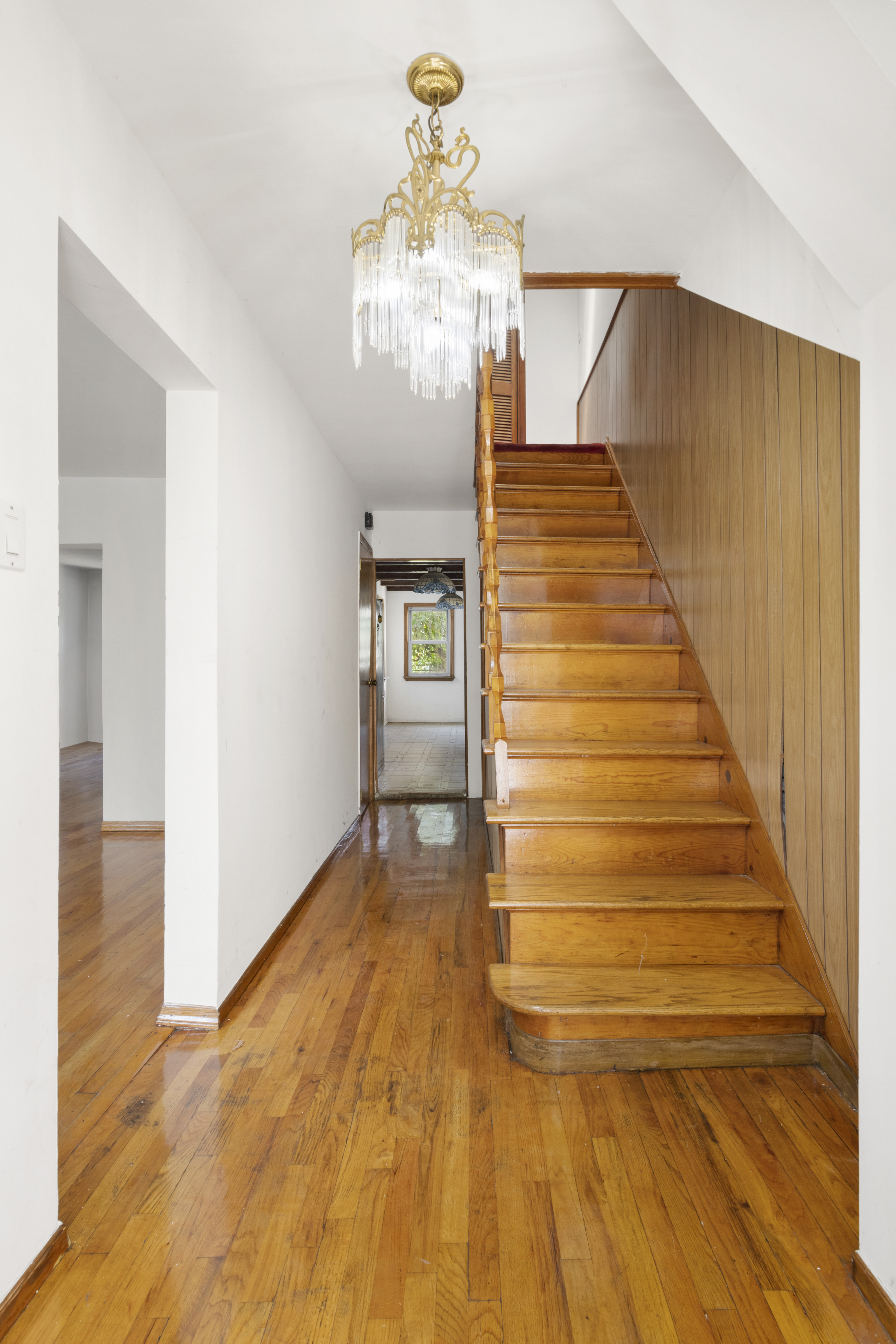 37-34 28th Street Queens, NY 11101 - Photo 9 of 17 a view of entryway and hall with wooden floor