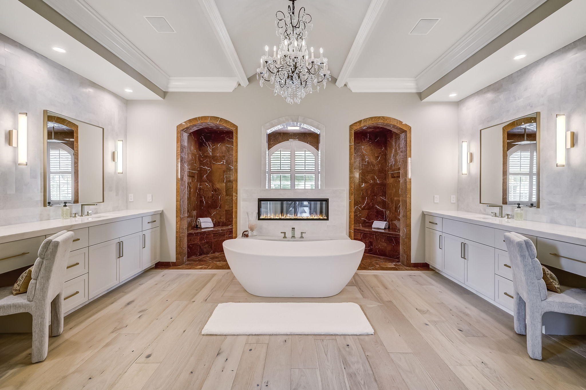 24624 Harbour View Drive Ponte Vedra Beach, FL 32082 - Photo 70 of 186 a spacious bathroom with a double vanity sink a two mirror a bathtub and a window