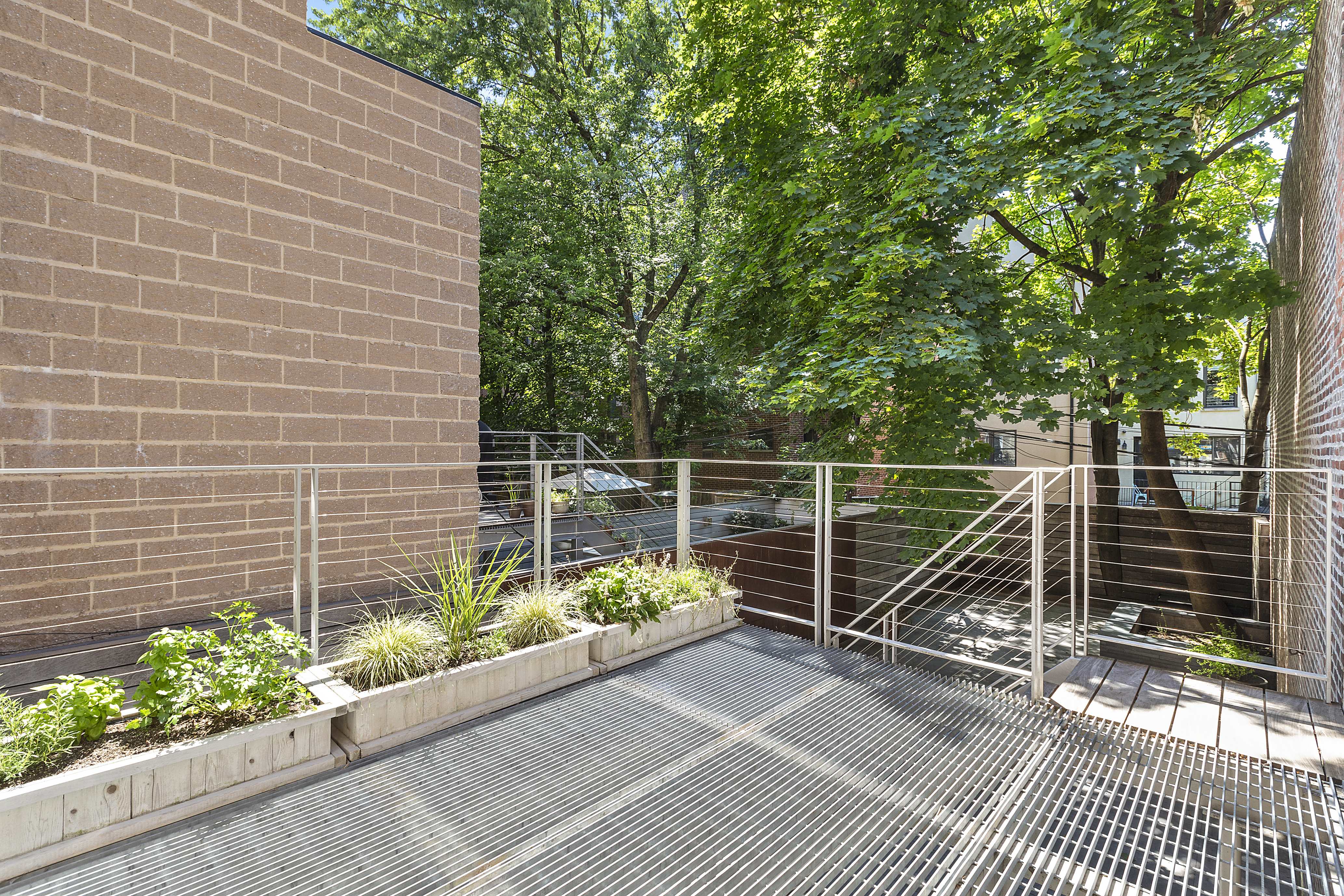 64 Clifton Place Brooklyn, NY 11238 - Photo 7 of 22 a view of a house with a flower in a garden