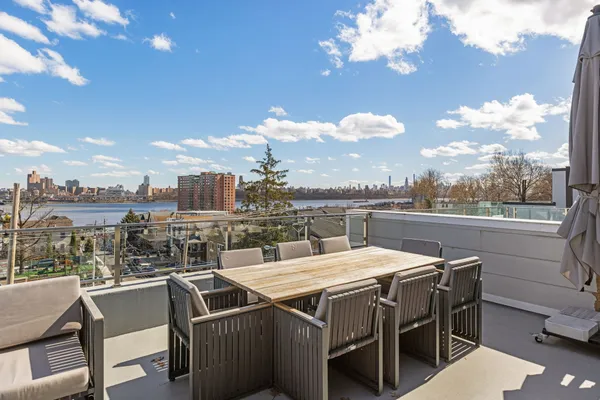 a view of a terrace with furniture