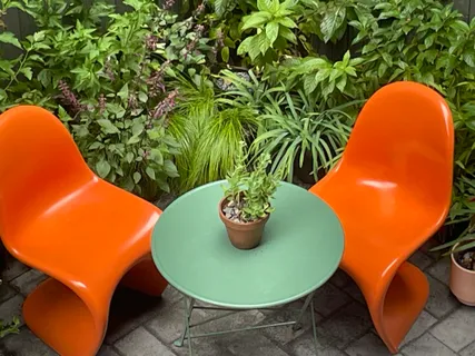 a view of a swimming pool in front of house