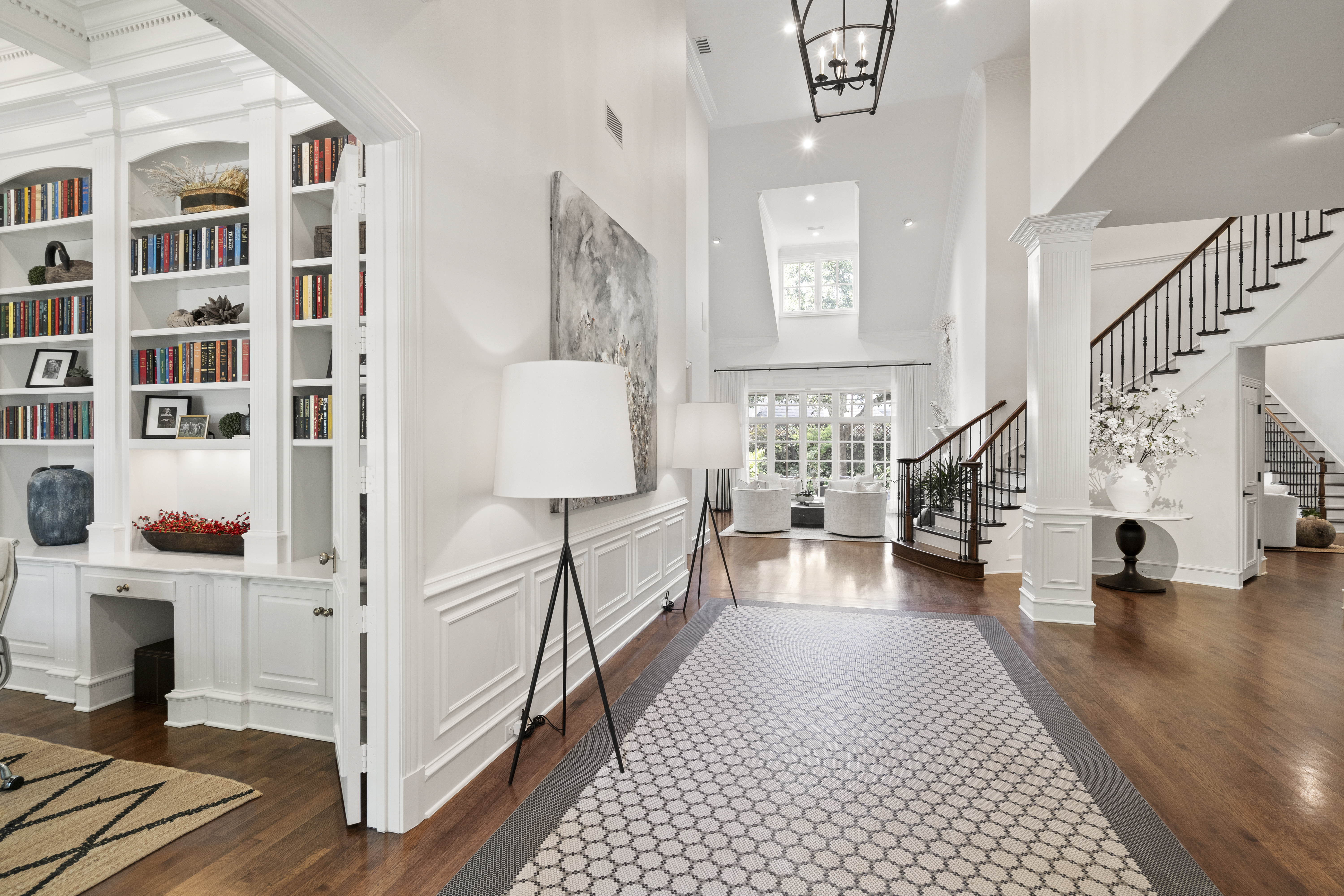 6607 Meadow Road Dallas, TX 75230 - Photo 2 of 32 a view of entryway with livingroom and wooden floor
