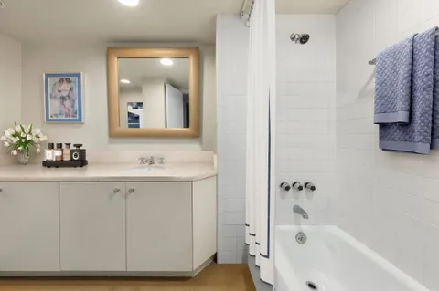 a bathroom with a sink and a bathtub