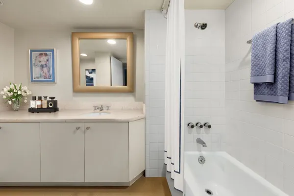 a bathroom with a sink and a bathtub