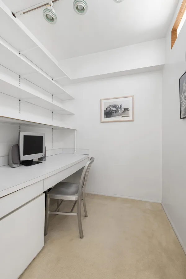 a room with a table and a chair