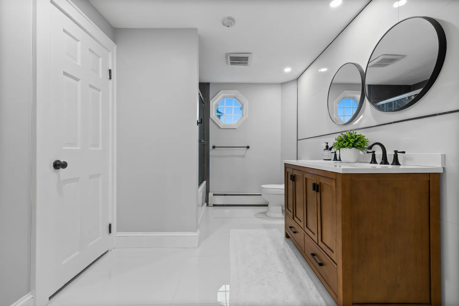 a hallway with washer and dryer