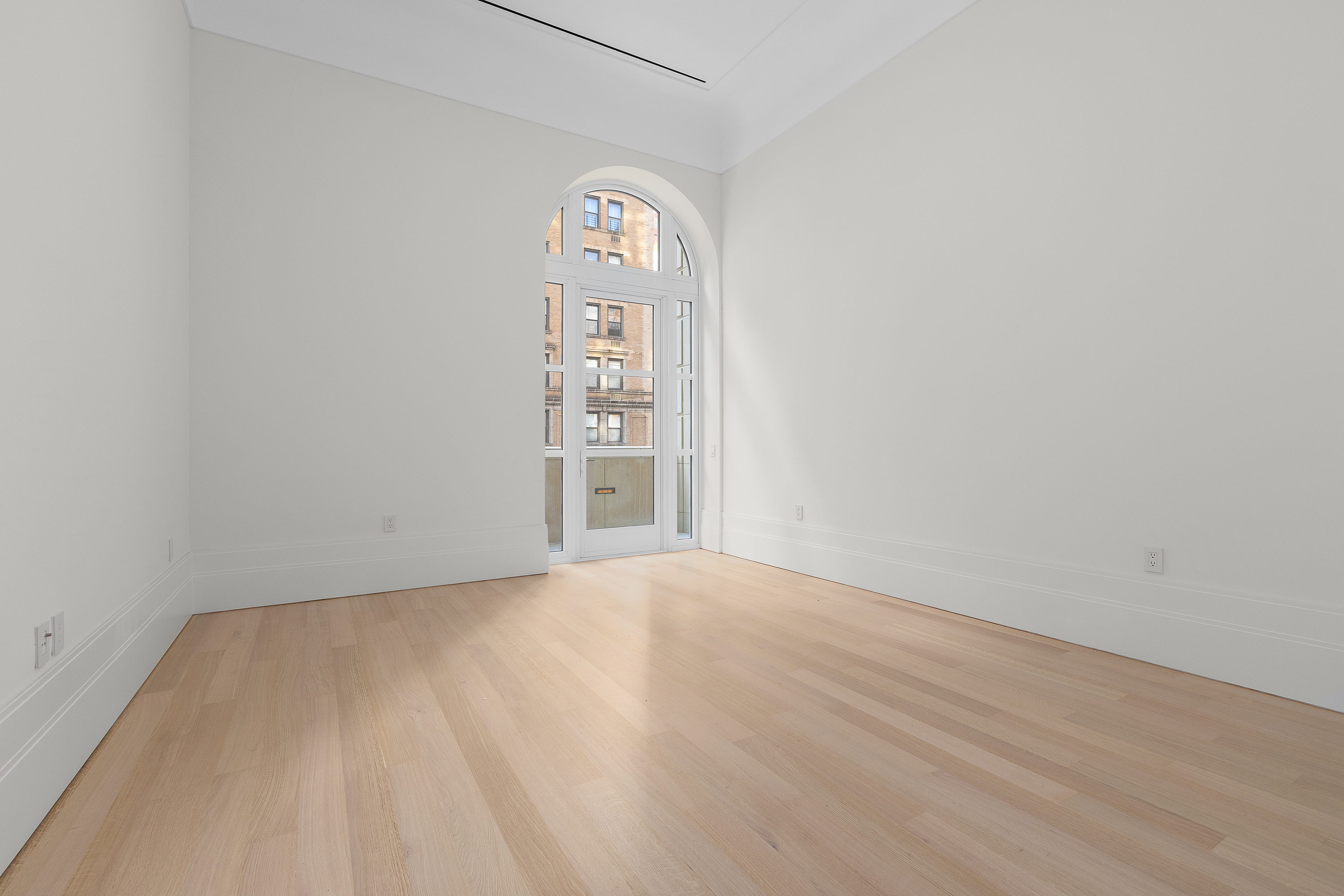 1165 Madison Avenue, Unit 3S Manhattan, NY 10028 - Photo 9 of 25 an empty room with windows