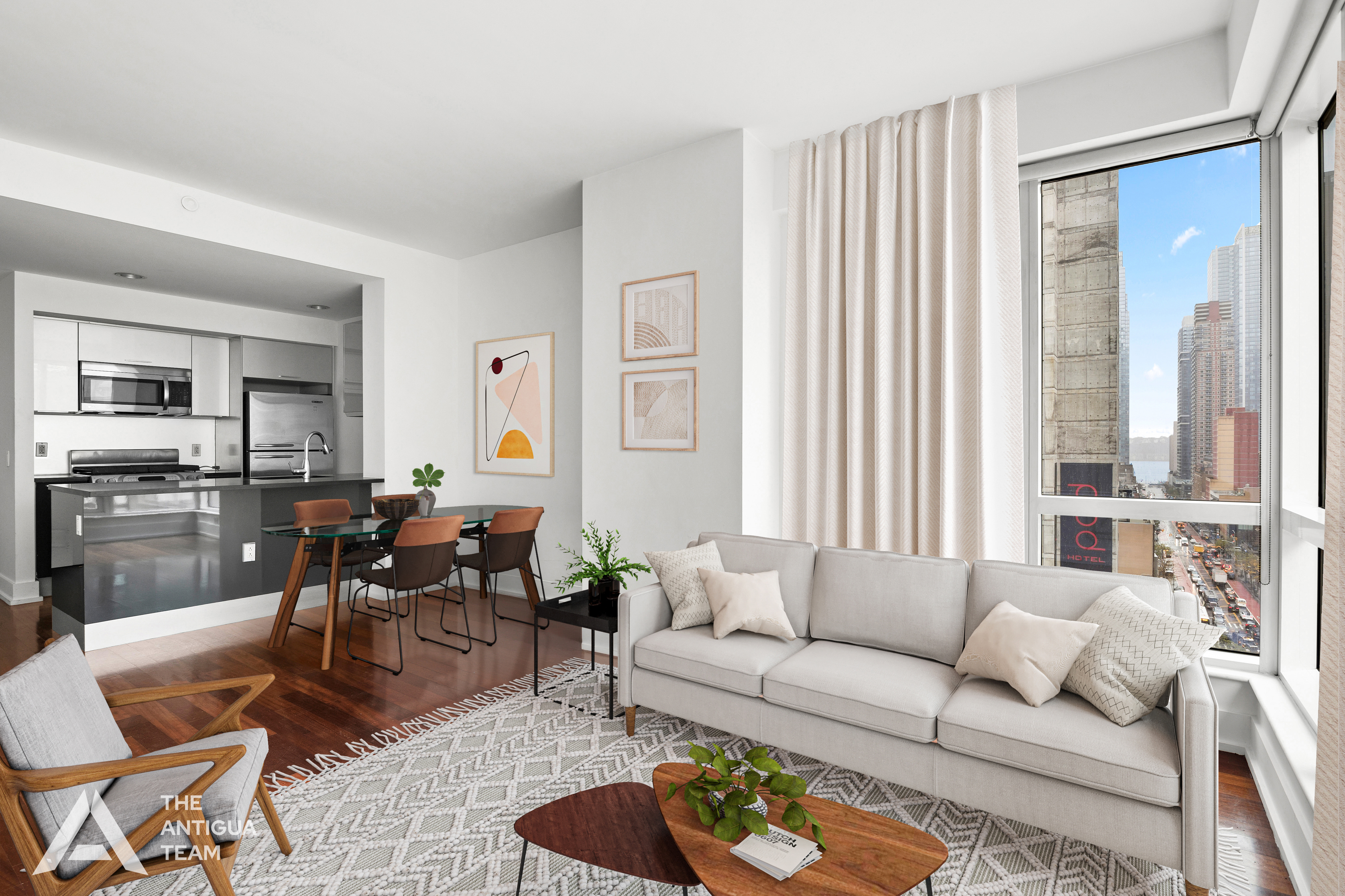 350 West 42nd Street, Unit 12C Manhattan, NY 10036 - Photo 3 of 21 a living room with furniture kitchen view and a large window