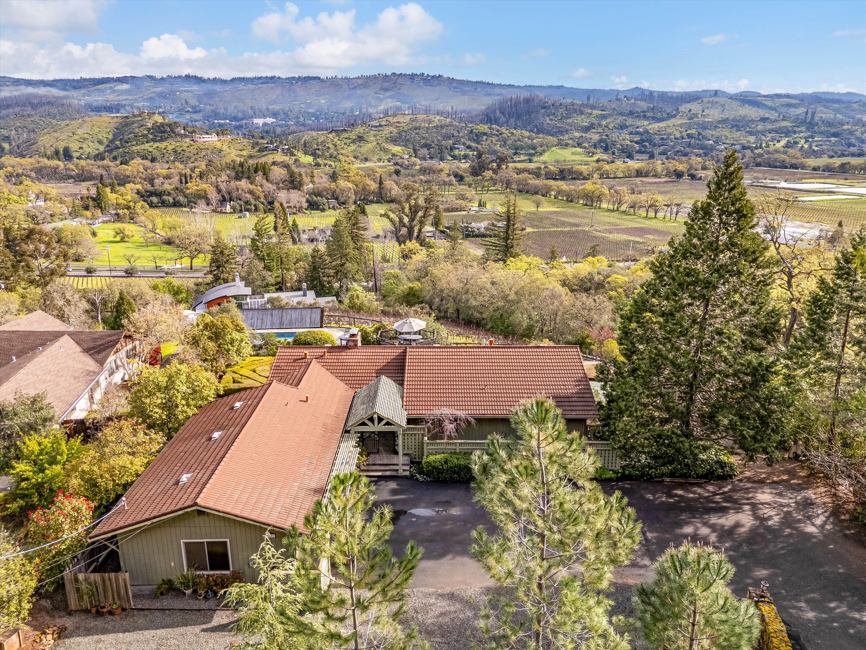 1291 Rockland Drive St. Helena, CA 94574 - Photo 2 of 26 a view of a city with an ocean view