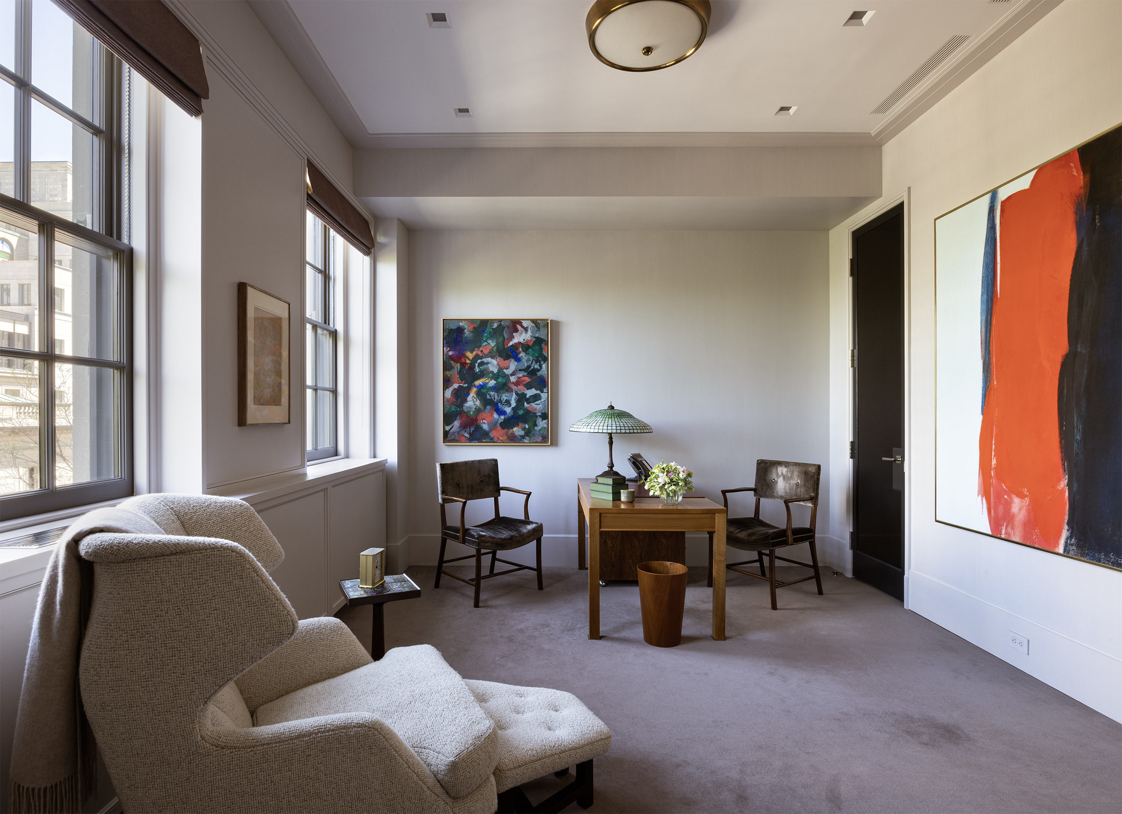 2 East 70th Street, Unit 4A Manhattan, NY 10021 - Photo 9 of 17 a living room with furniture and a window