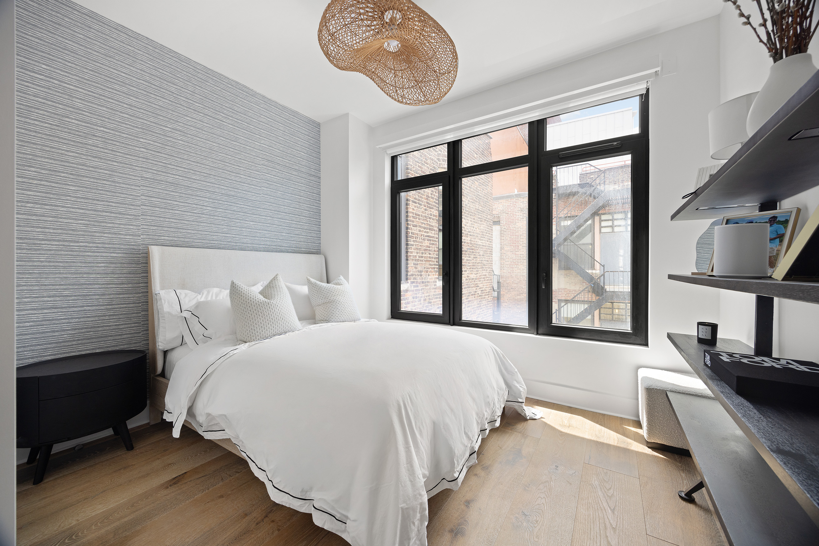 128 West 26th Street, Unit PH Manhattan, NY 10001 - Photo 13 of 21 a bedroom with a large bed and a large window