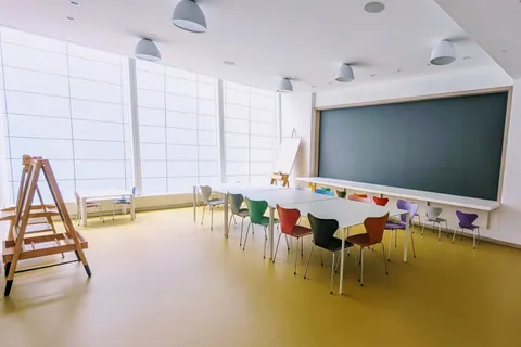 a room with lots of potted plants