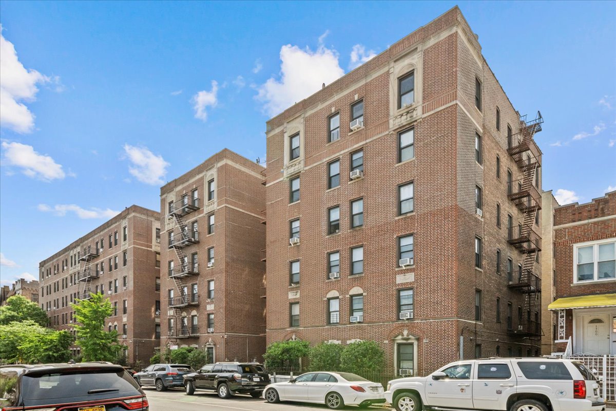 1710 Carroll Street, Unit D4 Brooklyn, NY 11213 - Photo 13 of 16 a city street lined with buildings and cars