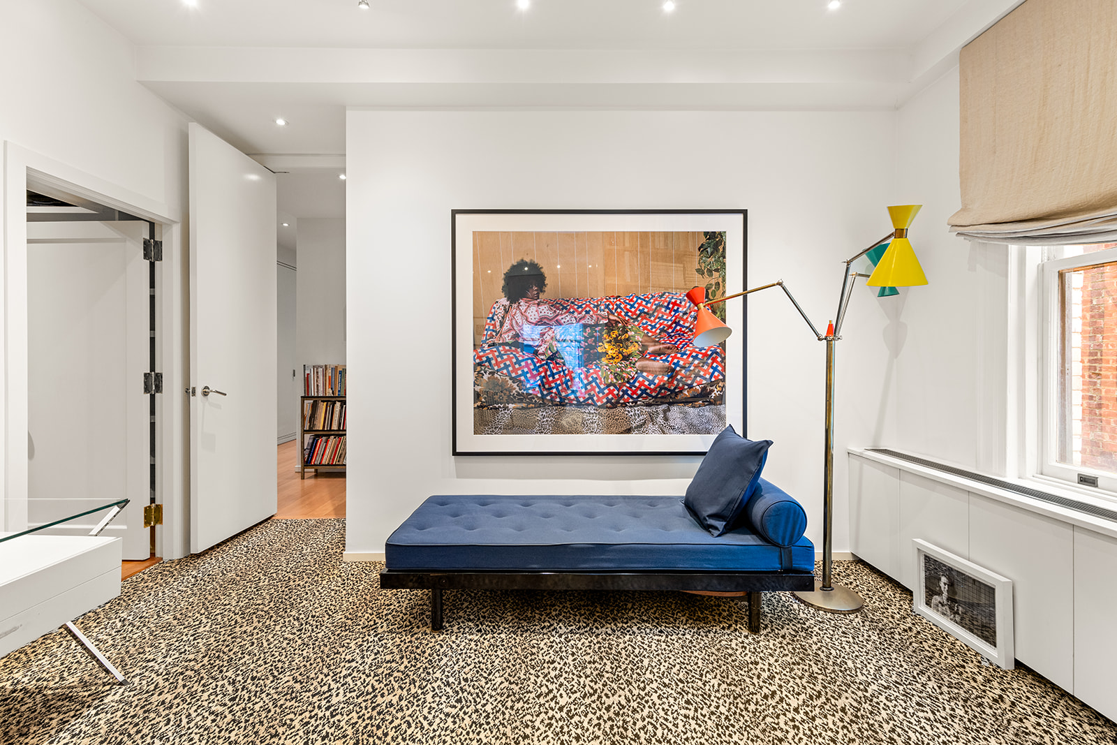 40 East 62nd Street, Unit 6E Manhattan, NY 10065 - Photo 17 of 25 a living room with furniture and a rug