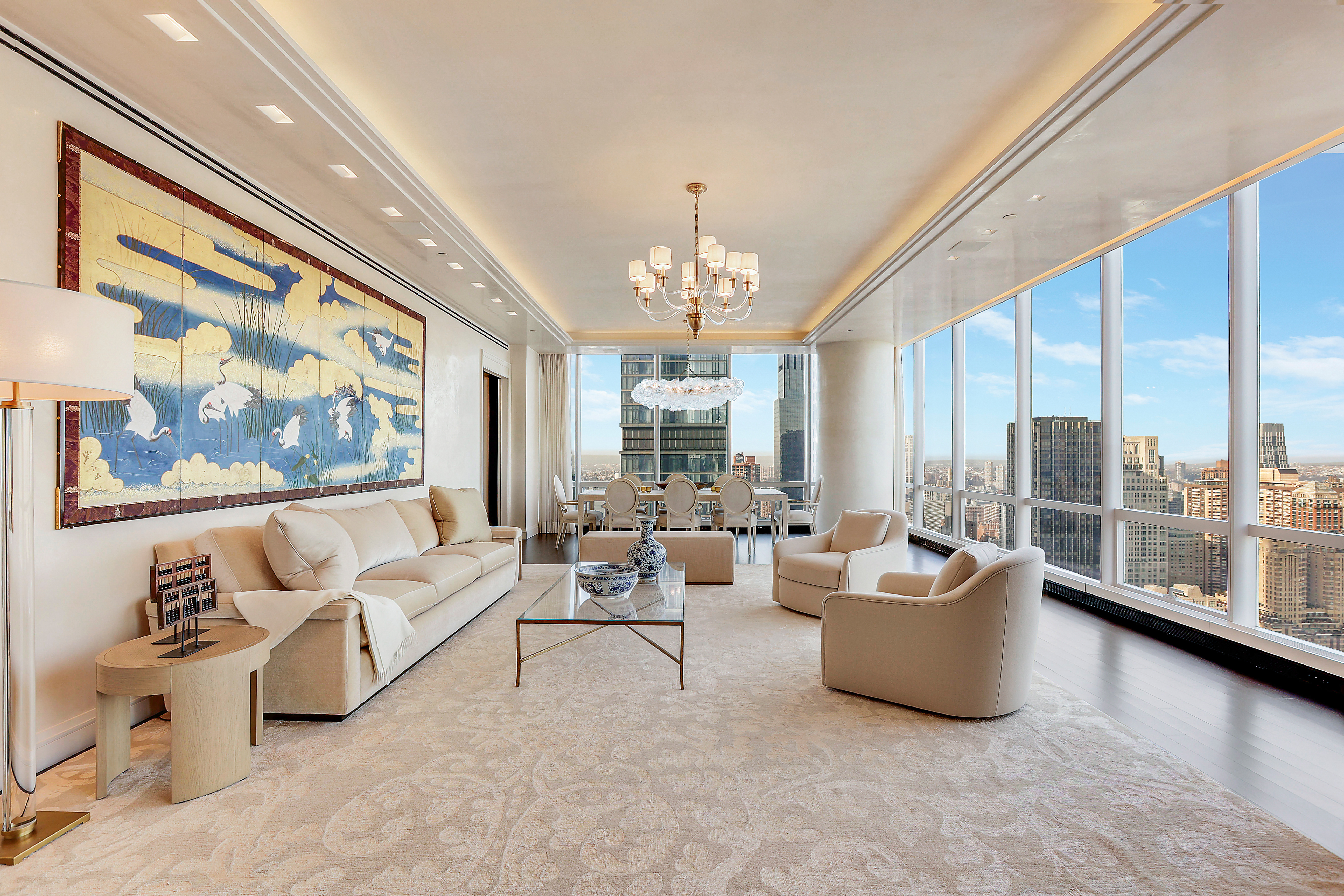 157 West 57th Street, Unit 51A Manhattan, NY 10019 - Photo 1 of 15 a living room with furniture and a large window