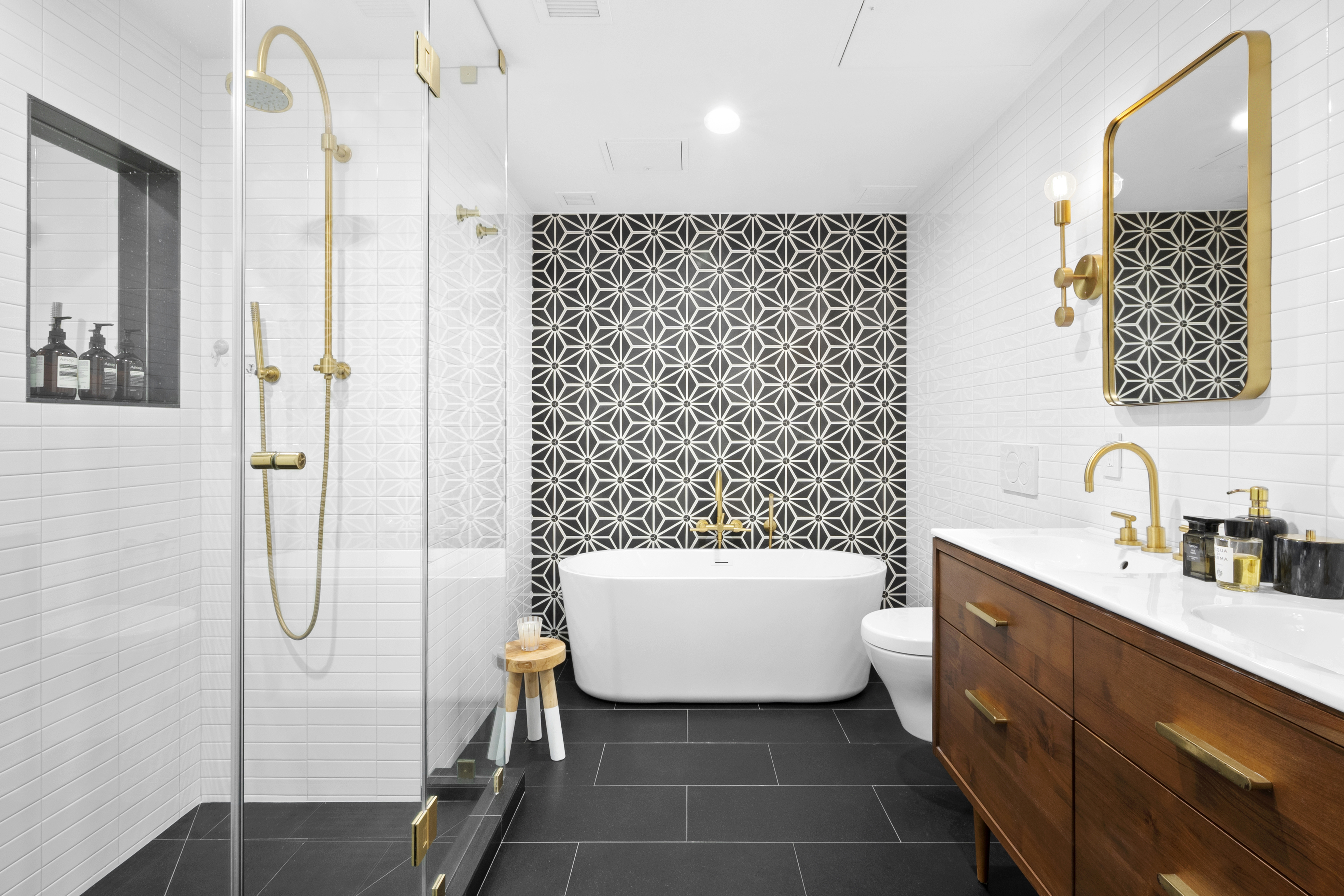 116 West 22nd Street, Unit 5 Manhattan, NY 10011 - Photo 8 of 15 a bathroom with a sink a toilet and shower