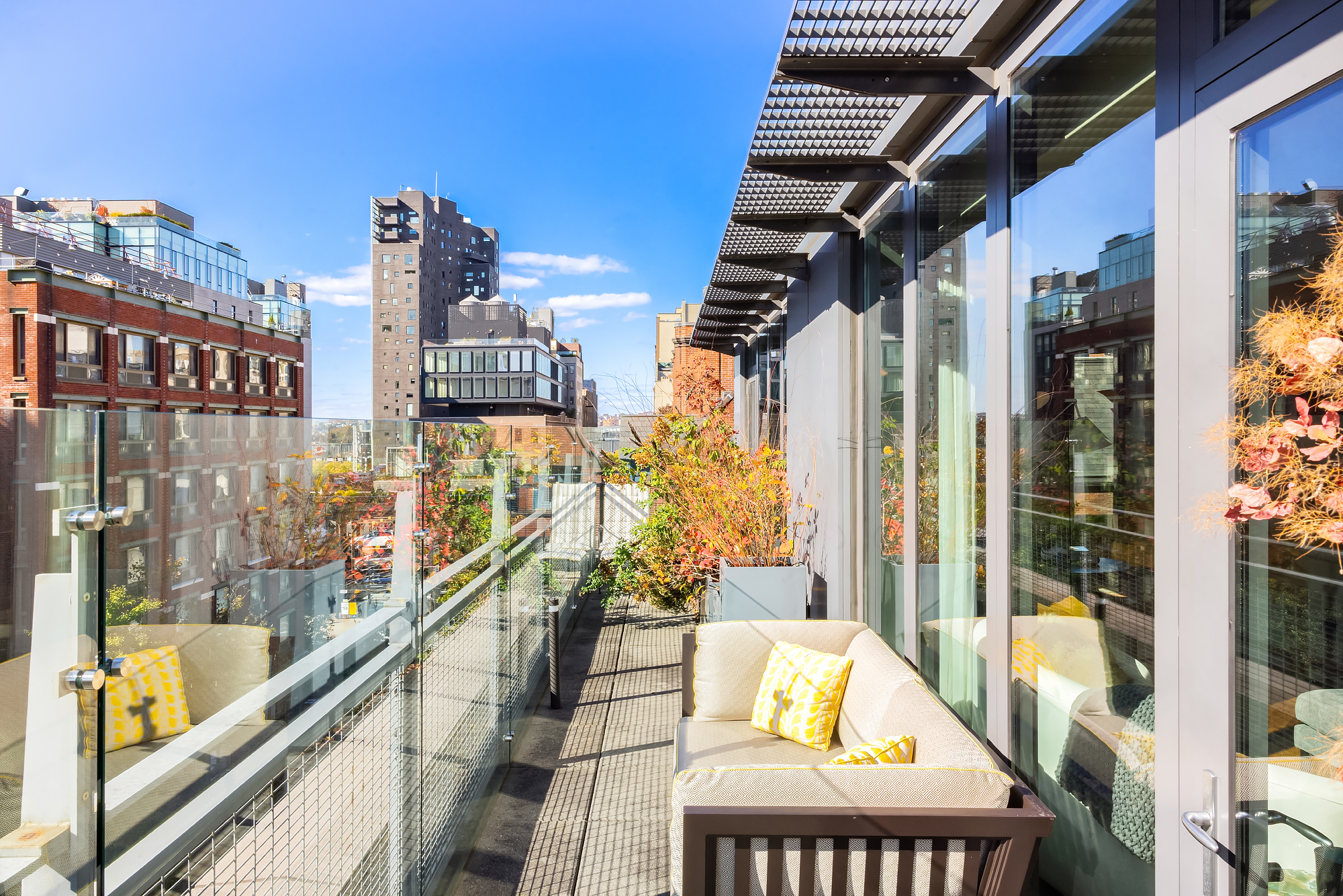 455 West 20th Street, Unit PH Manhattan, NY 10011 - Photo 3 of 21 a view of balcony with wooden floor