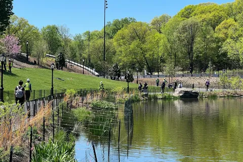 a view of a lake with a house