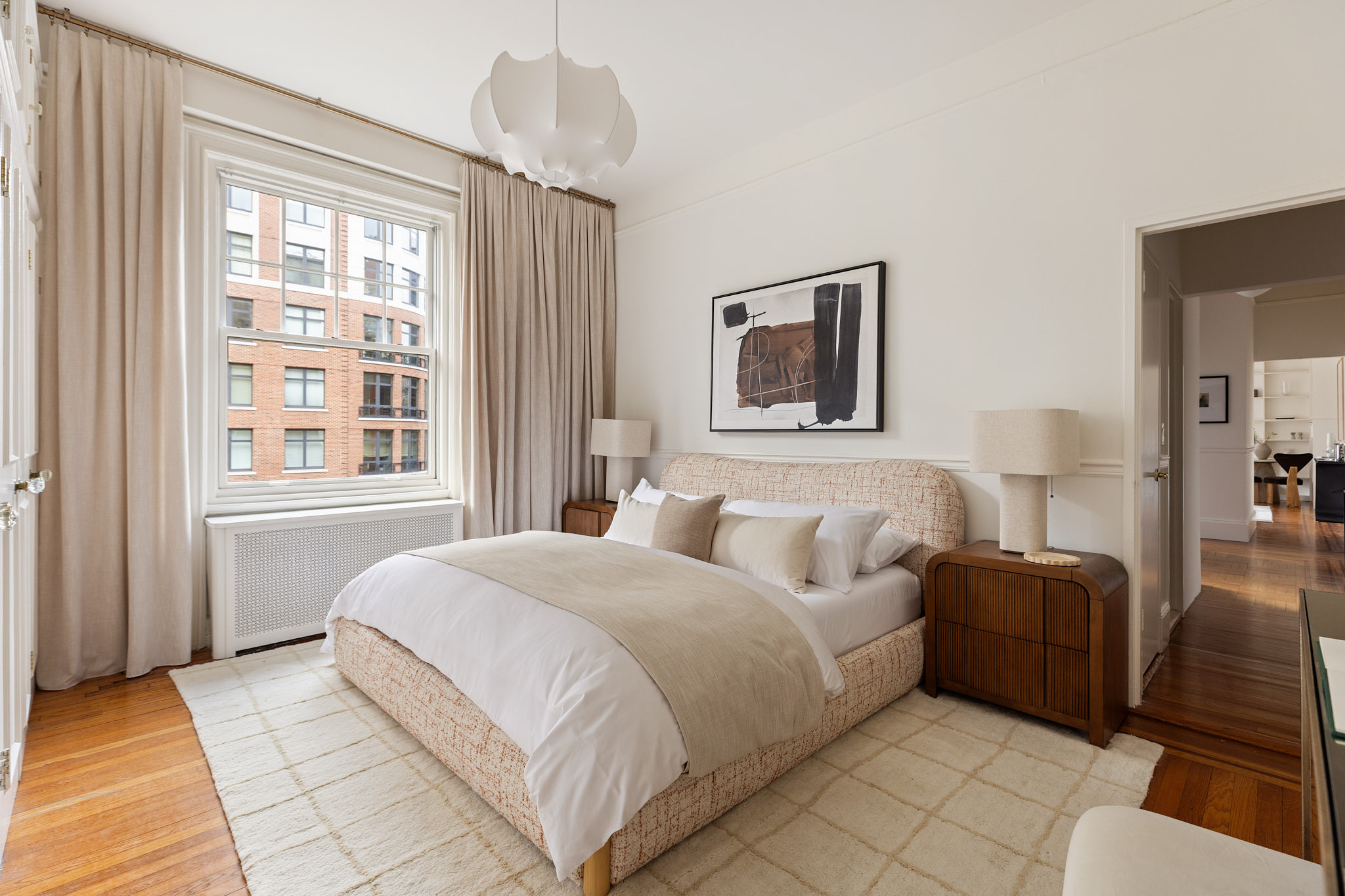 530 West End Avenue, Unit 81 Manhattan, NY 10024 - Photo 12 of 18 a bedroom with a bed and a window
