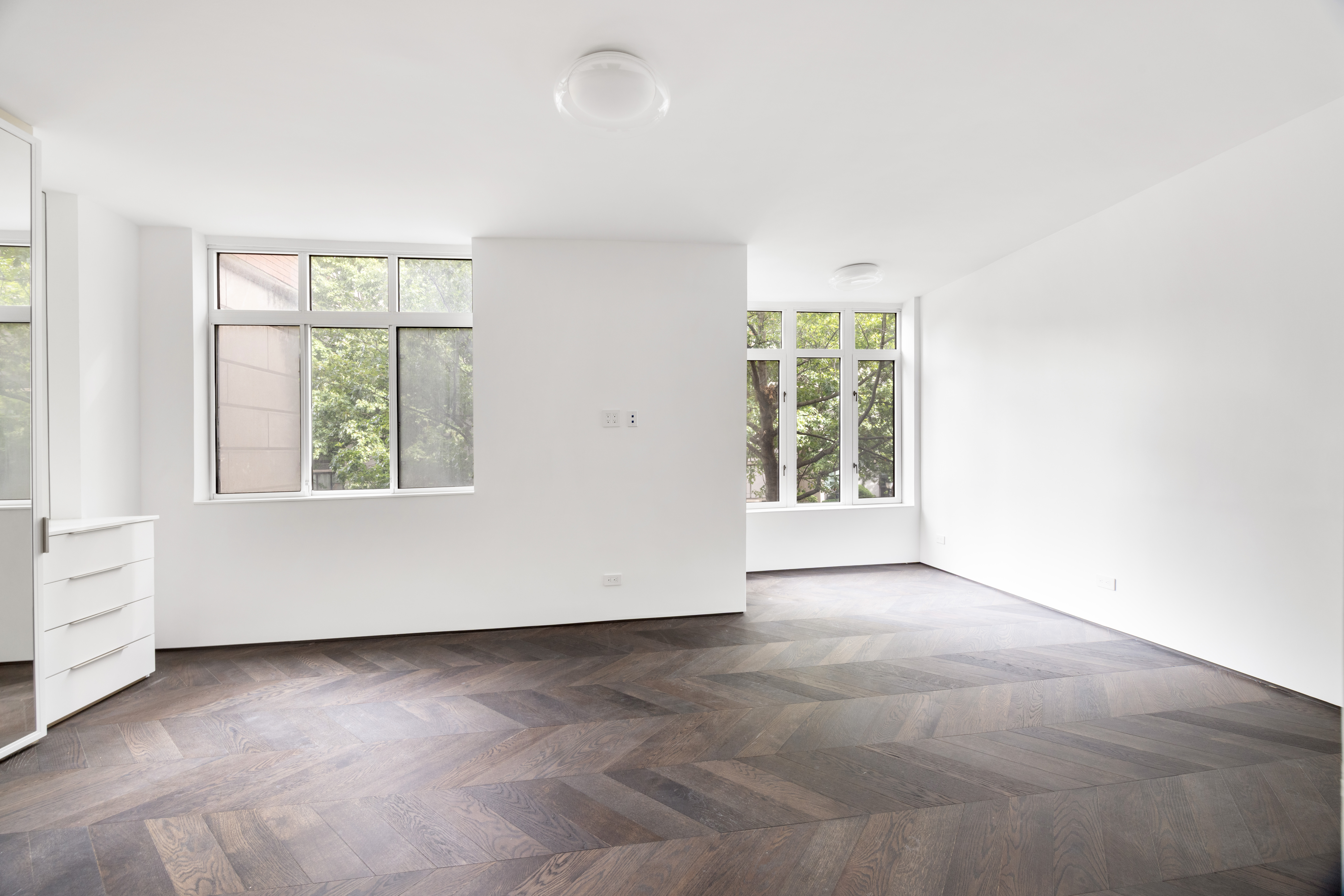 340 Albany Street Manhattan, NY 10280 - Photo 16 of 24 an empty room with windows