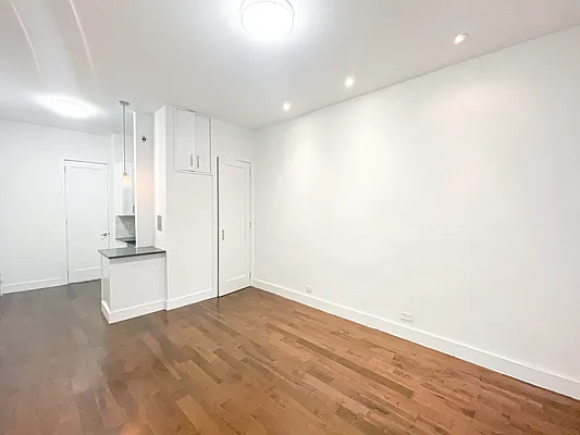 1736 2nd Avenue, Unit C Manhattan, NY 10128 - Photo 3 of 4 a view of kitchen with wooden floor