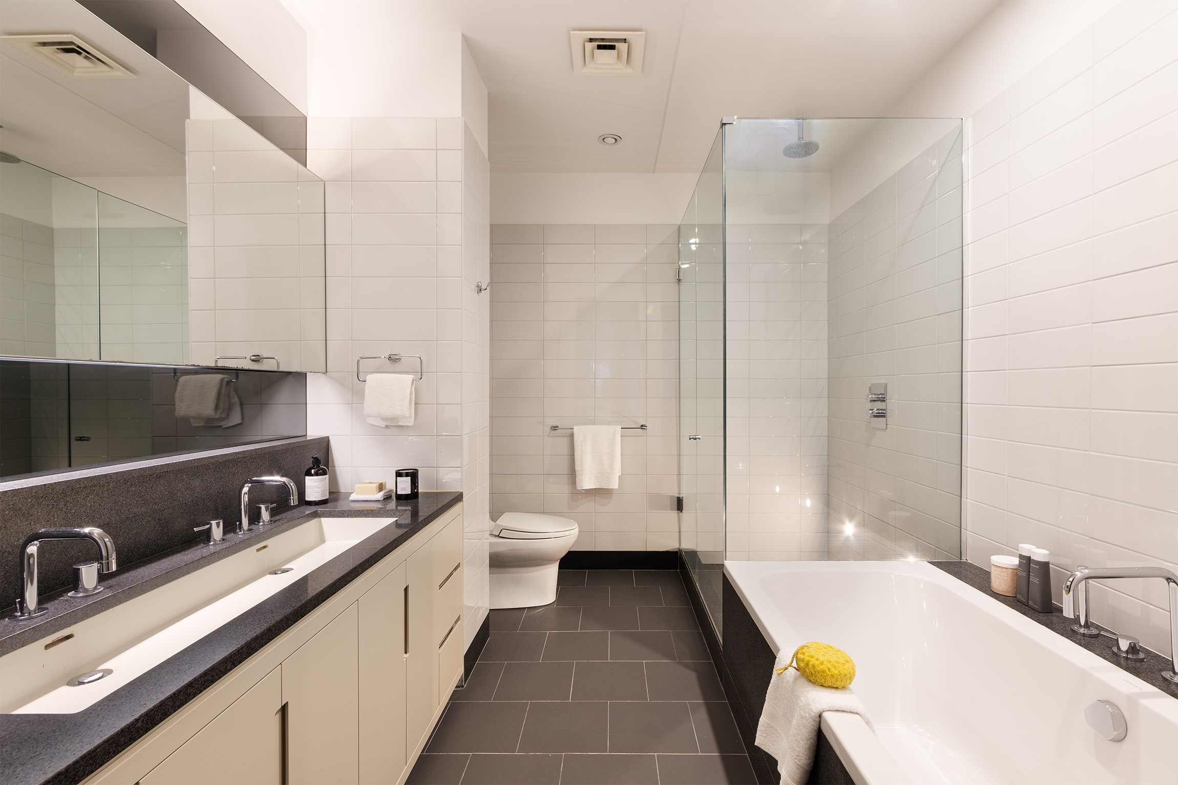 29 West 21st Street, Unit 5 Manhattan, NY 10010 - Photo 5 of 20 a bathroom with a tub sink and mirror