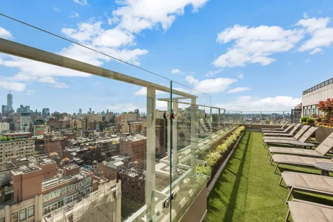 a view of a balcony with city view