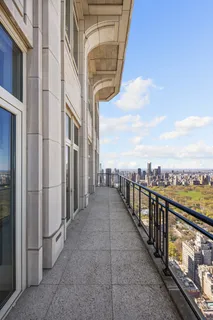 a view of a balcony with city view